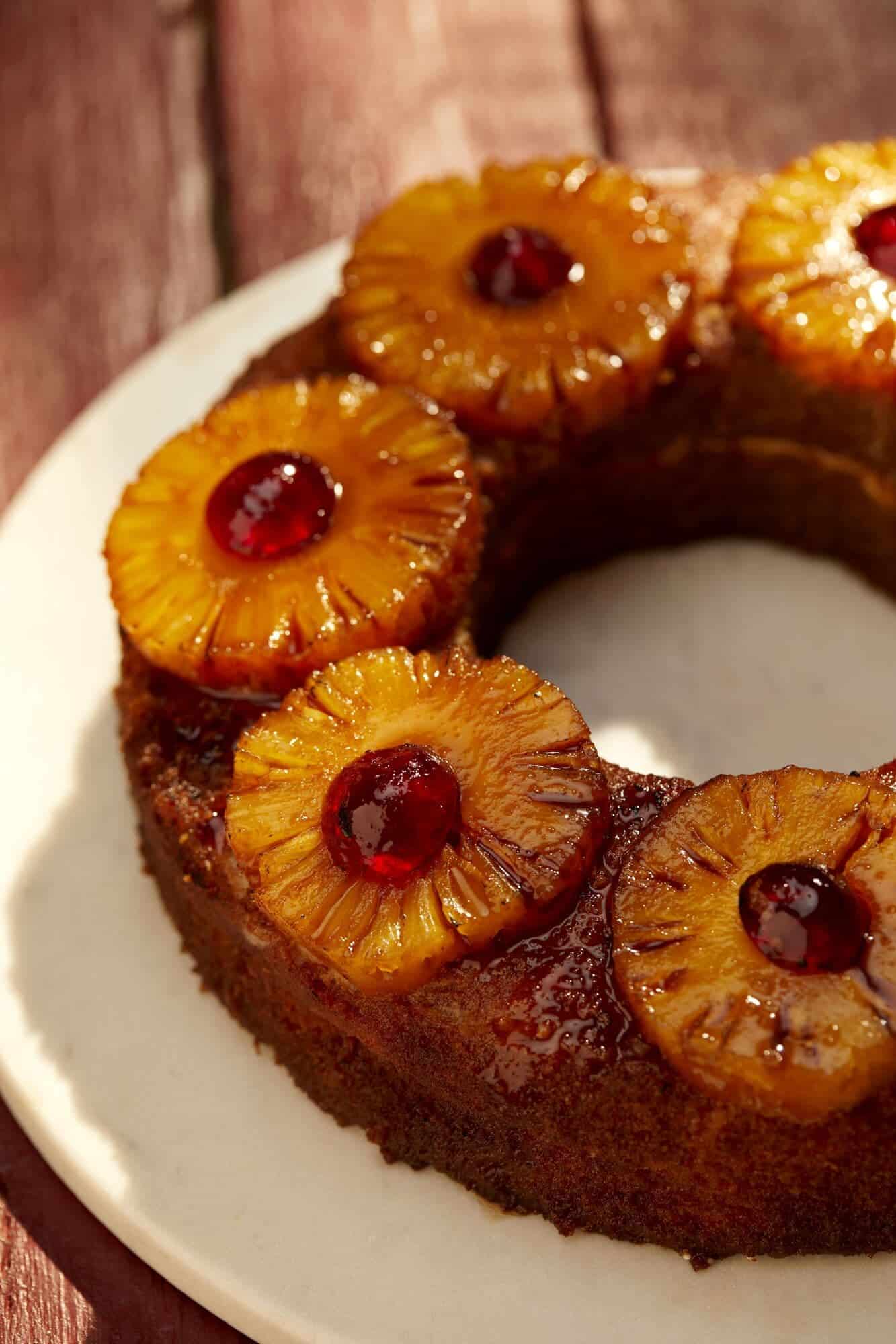 Bacardi rum cake with slices of pineapple and a rum butter glaze